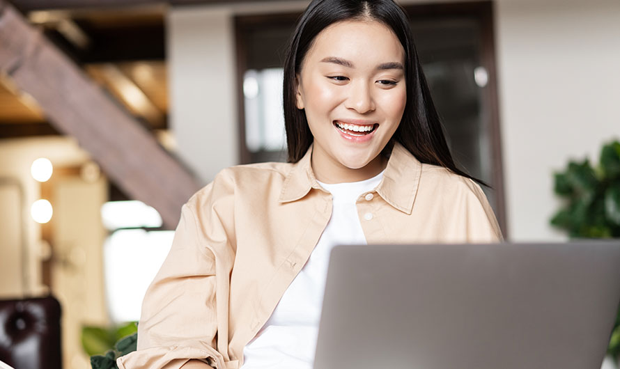 women happy browsing interactive website design